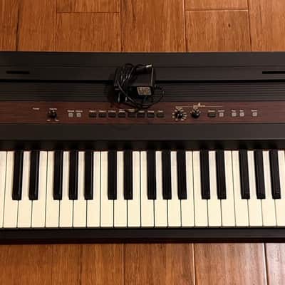 Roland ep-77 Digital Piano 76 Note Musical Keyboard w/Power Cable & Stand image 1