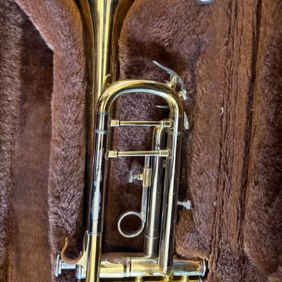 Trumpet with case and mouthpiece. Accent brand image 2