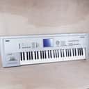 Korg Triton 61-Key 62-Voice Polyphonic Workstation 1999 Keyboard Silver