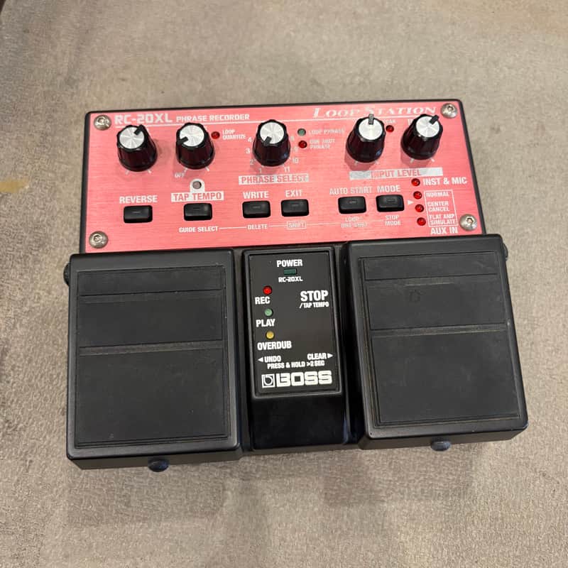 Pink and black RC-20 phrase recorder pedal with two attached power/control units.