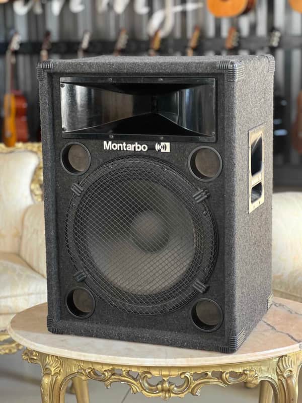 Black Montarbo speaker with front grille and side panel.