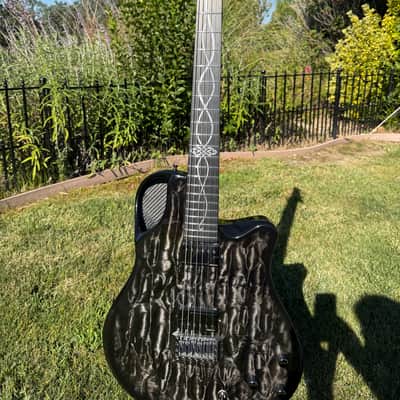 Emerald Virtuo 2024 Translucent Black Quilted Maple image 1