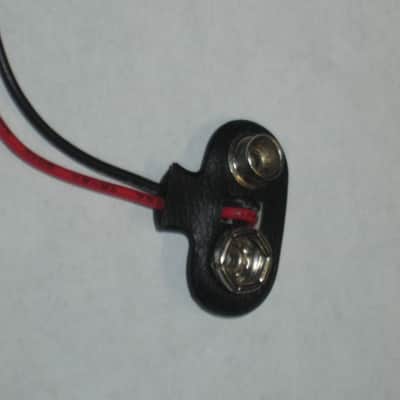 ONE very lightly used genuine Boss 9v battery clip [specifically for Boss pedals that use battery clip with black plastic covering near the terminal part (which are most of them) - but can be a replacement for the gray battery clip] image 8