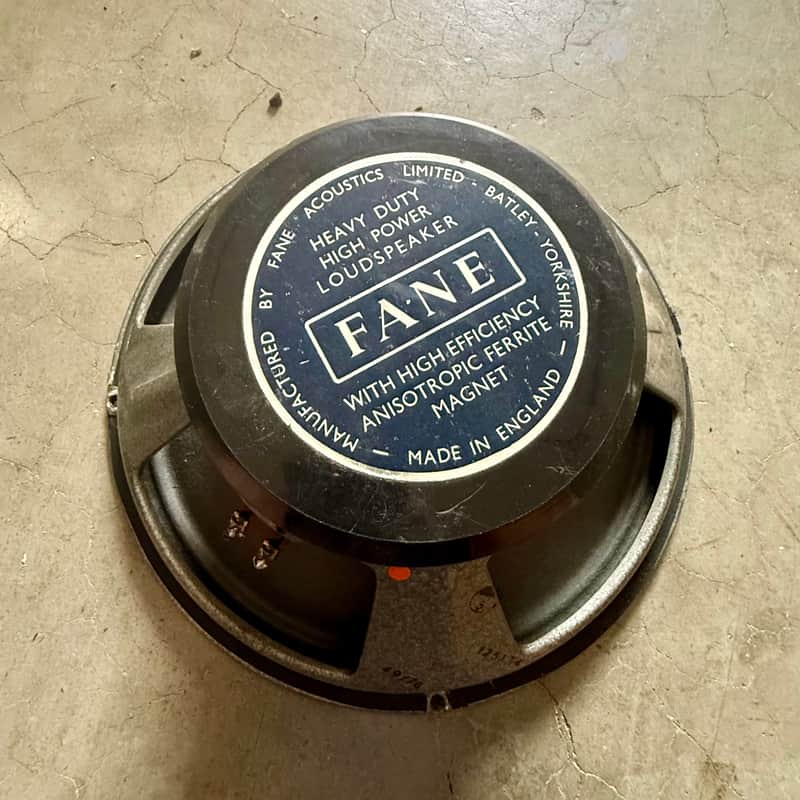 Silver and black speaker driver with "FANE" branding visible.