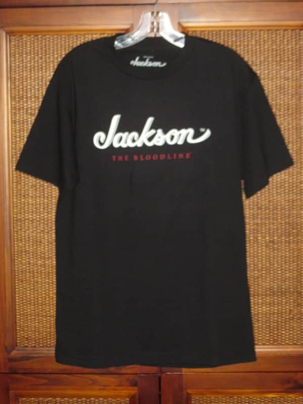new genuine Jackson (by Fender) Jackson Bloodline 100% Cotton Black Short Sleeve T-Shirt, Medium (M), GRAPHIC: White & Red -- P.N (part #): 0990264406 (NO: hangtag / packaging) image 1