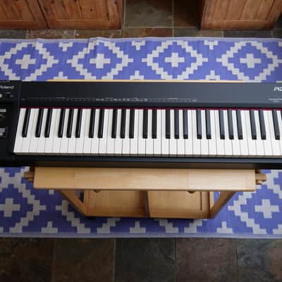 Roland RD-64 64-Key Weighted Stage Piano/MIDI Controller, 2013 + Case PSU manual