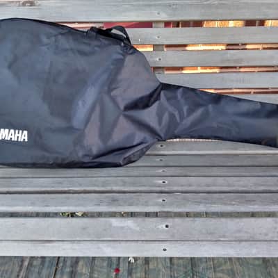 Yamaha F35 full size guitar with  gig bag, strap, capo, picks, strings, winder. image 12