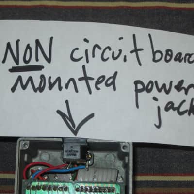 used Boss bottom plate (NO: rubber padding,label,serial number) for compact sized pedal - specifically from mid 1980s - metal, OUTER side: semi-gloss gray fiish / INNER side: flat gray finish -- back end has factory made small cut out for power jack image 6
