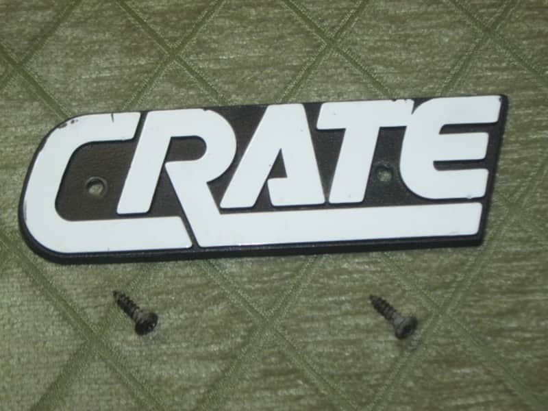 used - some imperfections genuine Crate bass amp Crate LOGO Plate (badge)- hard plastic - with 2 original screws (from a BX15 or BX25 bass amp - NO bass amp included) 1990s - early 2000s - Hard Plastic, white & black image 1