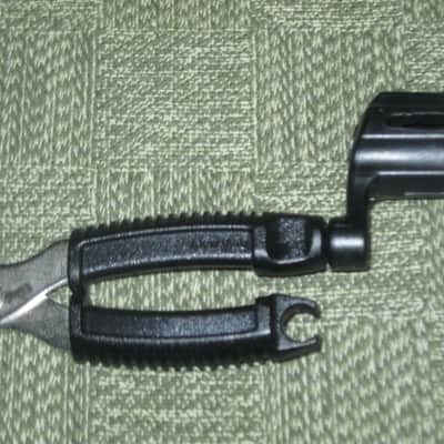 new (no package) very near A+ D'Addario Planet Waves PRO-WINDER Black String Winder & Cutter & Bridge Pin Puller DP0002 for guitar, mandolin, ukulele & banjos (black hard plastic with hardened steel wire cutters) just has few minor natural imperfections image 20