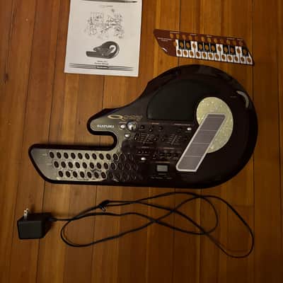 Suzuki QC-1 QChord 1999 - Red image 1