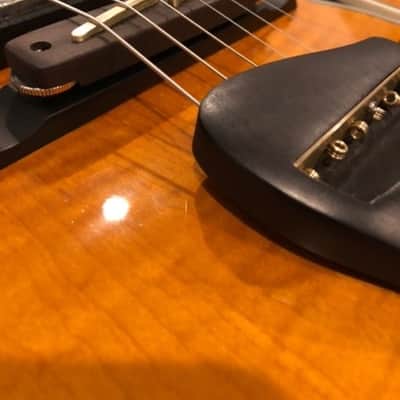 O. C. Guitars ebony wood bridge with brass saddles. equator and many other hollow bodies. image 3