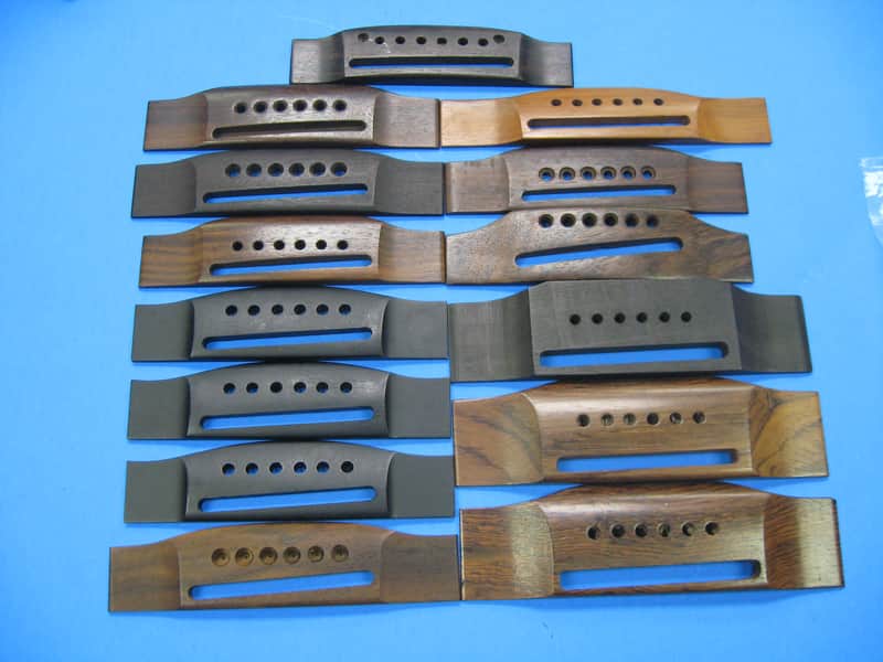 Large Lot of (14) Wide Saddle Acoustic Guitar Bridges image 1