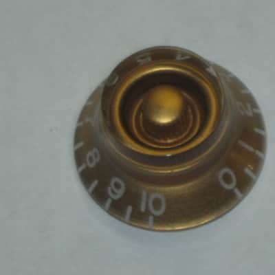 TWO very lightly used genuine Gibson Gold TOP HAT Knobs (ONLY 2 of the 4 knobs from PRHK-020 set are for sale) TOP Edge of ONE OF THE KNOBS has two very short very light nick image 3