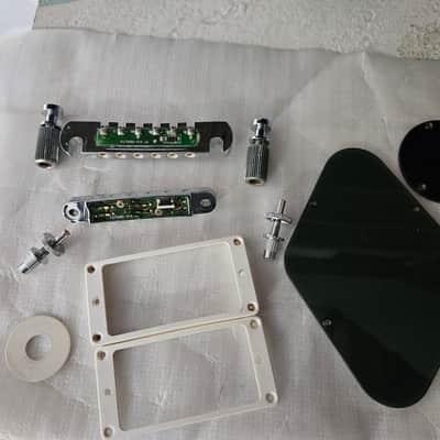 Gibson Robot Les Paul 1st generation - bridge, tailpiece, pickup mounts, poker chip and cavity covers image 2