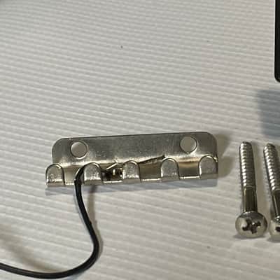 1990's Jackson King V & Dinky Guitars JT-580 Takeuchi Black Licensed Floyd Rose Tremolo Guitar Bridge image 2
