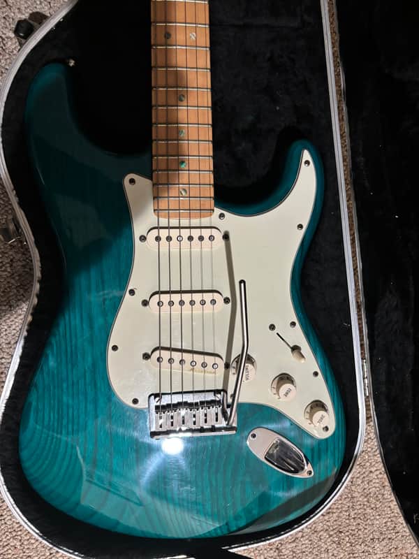Fender American Deluxe Stratocaster with Maple Fretboard 1999 - 2003 - Teal Green Transparent