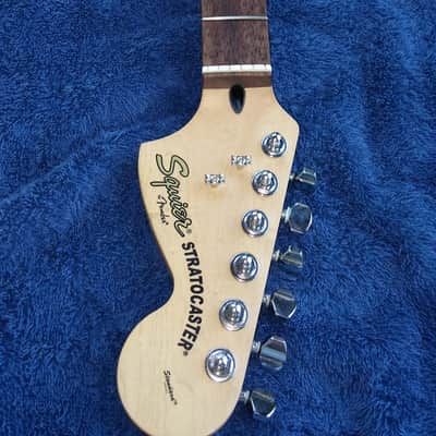 Clean- Fender/Squire- 22 fret Stratocaster neck w/70's headstock, rosewood board, skunk stripe image 1