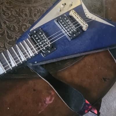 Jackson RR5 Rhoads Pro V-Style Electric Guitar with a Trans Blue Flame Finish image 11