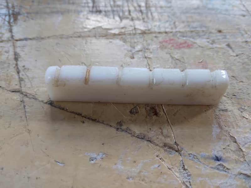 Unbranded Plastic Guitar Nut 1960s - White image 1