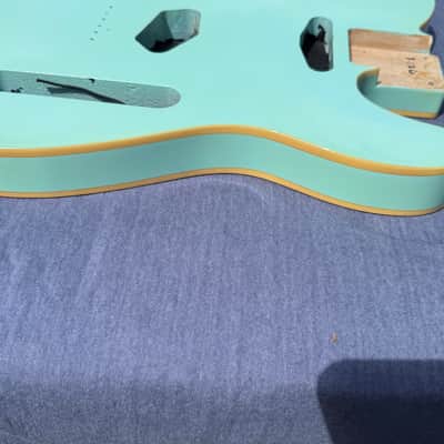 Non-branded product T-Style body 2021-2024 - Clear urethane over daphne blue. image 1