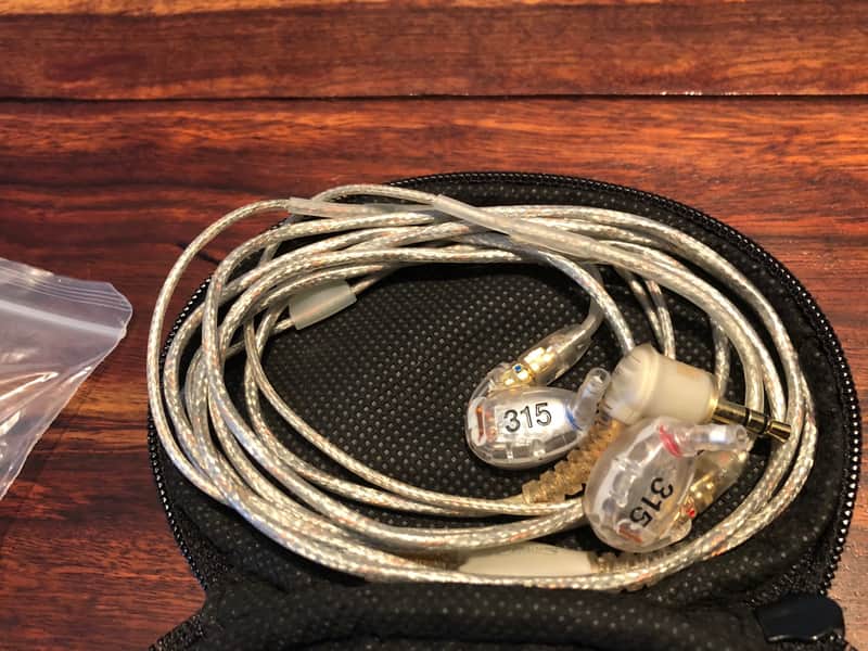 Shure Shure SE315 in-ear monitors, sound isolating earphones clear image 1