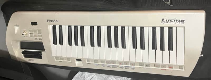 Roland AX-09 Lucina 37-Key Keytar Synthesizer | Reverb
