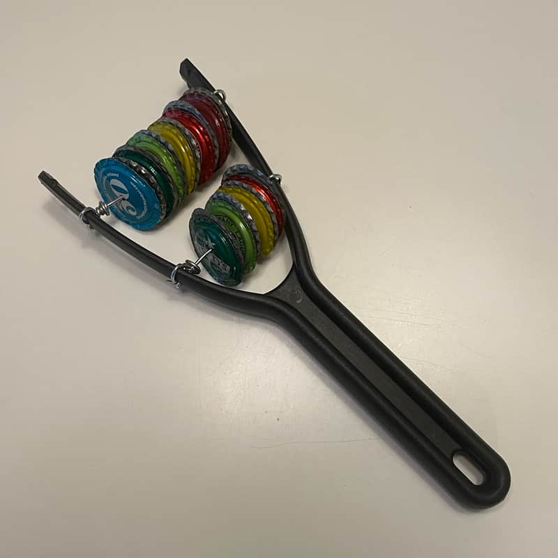 Upcycled Percussion - Slingshot Shaker - Multicolored Bottle Caps image 1