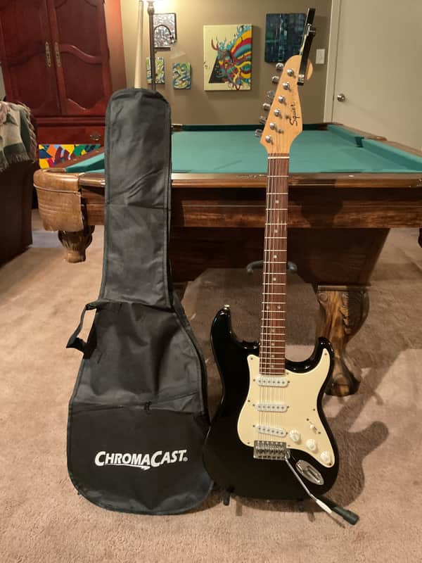Fender Squire  Stratocaster with new gig bag and a Capo image 1