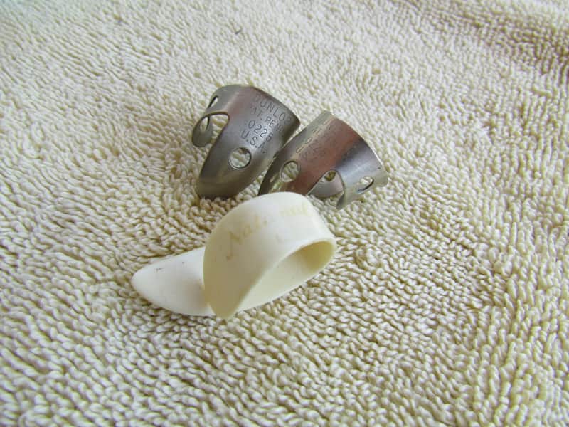 2 Dunlop .0225 Fingerpicks & National Thumbpick Good Used Condition National Thumbpick And 2 Metal Fingerpicks image 1