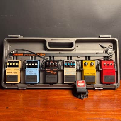 Boss pedal and board BCB-6 PSM-5 OD-1 DD-2 HM-3 CH-1 AW-2 chorus distortion auto wah overdrive delay