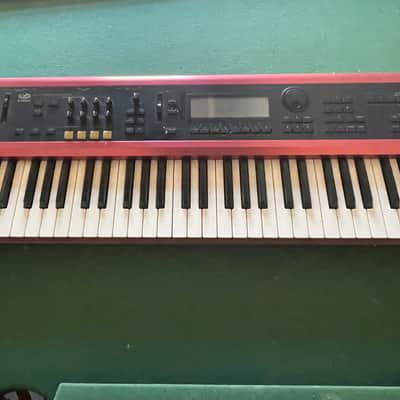 Korg Karma 2000s - Red
