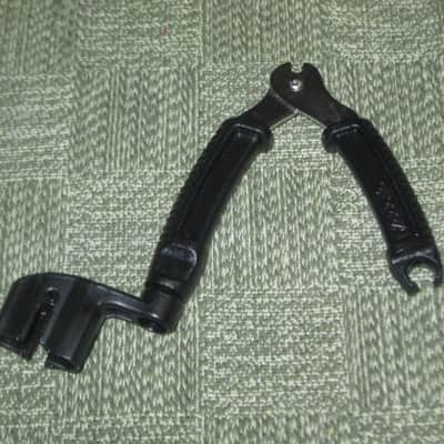 new (no package) very near A+ D'Addario Planet Waves PRO-WINDER Black String Winder & Cutter & Bridge Pin Puller DP0002 for guitar, mandolin, ukulele & banjos (black hard plastic with hardened steel wire cutters) just has few minor natural imperfections image 1