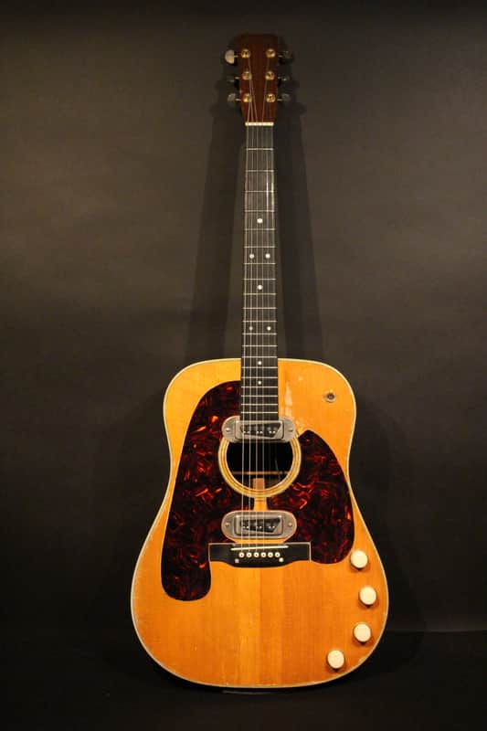 1959 Martin D 28 E natural with a non original hardshell case image 1