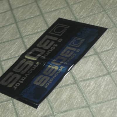never used genuine BOSS sticker sheet (1 sheet has 2 stickers) 1) BOSS a sound innovator - colors Silver, Blue, Black Silver & 2) BOSS a sound innovator - colors Silver & Black (specifically from 1988), was orig paired w/ a DC3 Japan (pedal NOT included) image 17