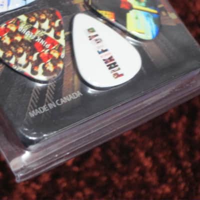 new in package (old stock) A+ Perri's Leather Ltd. / Perri's 12 Pack Of Pink Floyd Guitar Picks - Med Gauge - Celluloid Plastic, 351 shape - but slightly curved (LP12-PF1) LP12PF1 image 23