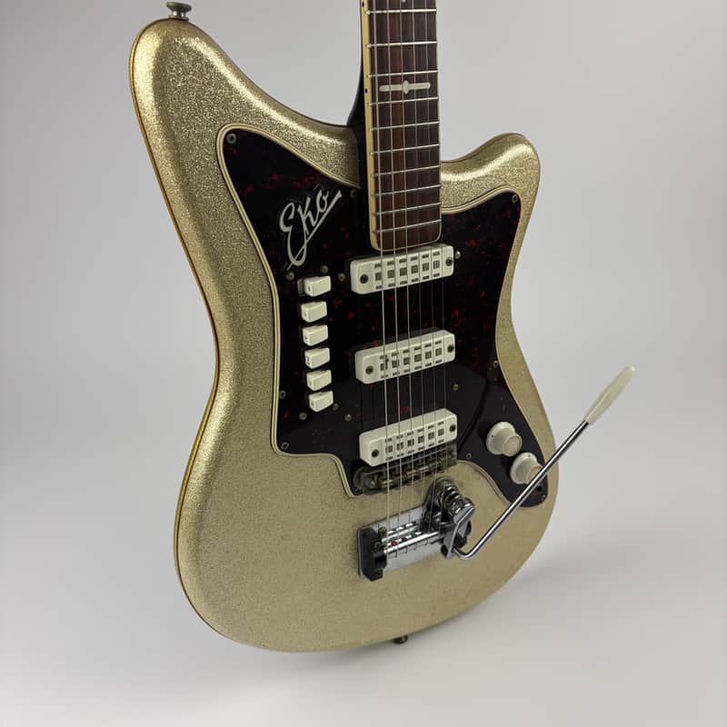 EKO 500/V3 1960s Silver Metalflake finish on top Black back and sides., Rosewood bound Fingerboard, all Switches/ Pickups working!!!, Tremelo, padded gigbag included. image 1