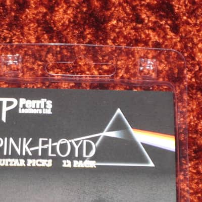 new in package (old stock) A+ Perri's Leather Ltd. / Perri's 12 Pack Of Pink Floyd Guitar Picks - Med Gauge - Celluloid Plastic, 351 shape - but slightly curved (LP12-PF1) LP12PF1 image 14