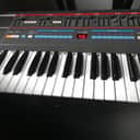 Roland Juno-106 61-Key Programmable Polyphonic Synthesizer 1984 - 1985 - Black