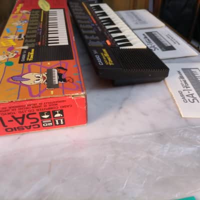 Casio SA-1 3 BOOK MANUAL 6 PATTERN PULSE CODE MODULATION PCM 100 TONE BANK 1989 - mini keyboard with complex LO-FI wavetable sounds PC Kid Techo Punk pop Japan Anime Manga Black BOXED RARE image 8