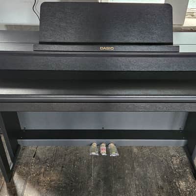 Casio GP-310 Celviano Grand Hybrid Digital Piano in Black.