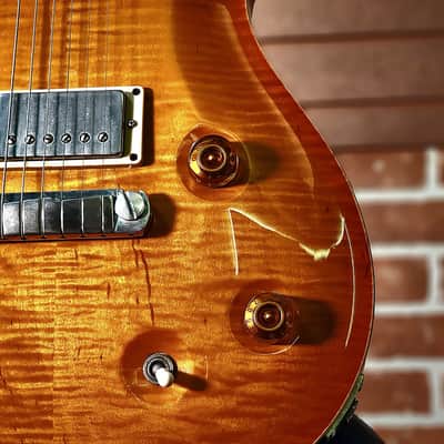 with a Flame Maple top, Mahogany neck with a Wide-Fat profile, East Indian Rosewood fretboard with moon inlays, Straight stoptail bridge, McCarty treble and bass pickups, finished in McCarty Sunburst, with nickel hardware. image 5