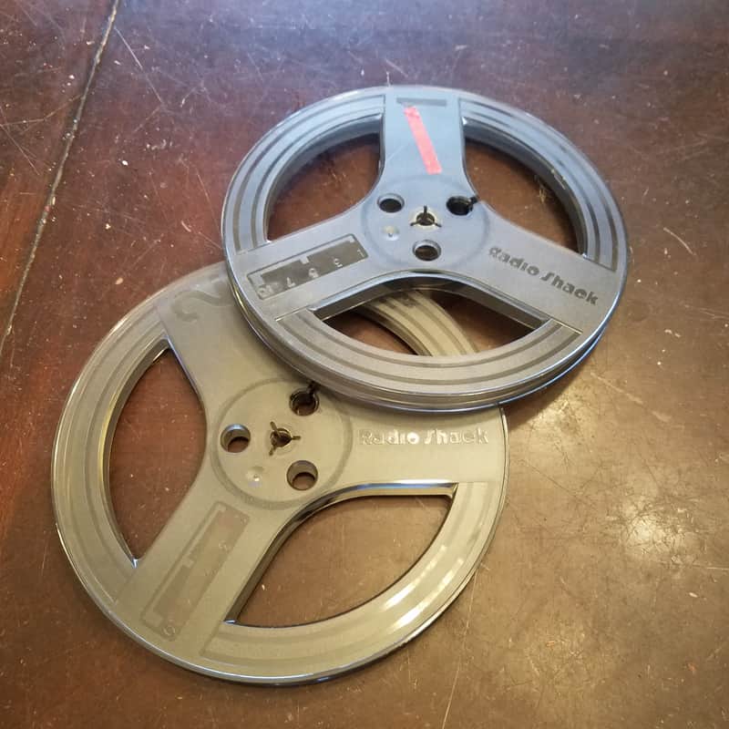 Radio Shack pair 7" R2R tape reels 1/4" magnetic tape take up supply USA made 1970s - dark grey plastic image 1