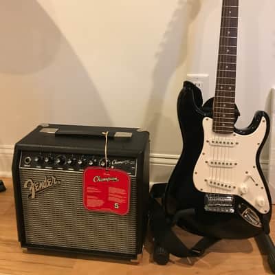 Squire and Fender Stratocaster and Champion 20 amp. 2017 Black image 1