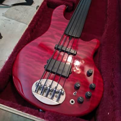 Lakland 55-94 Deluxe, fretless 34" scale, 1996 Red Quilted with case image 1