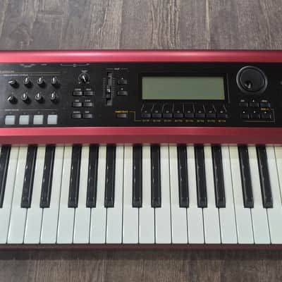 Korg Karma 2000s - Red