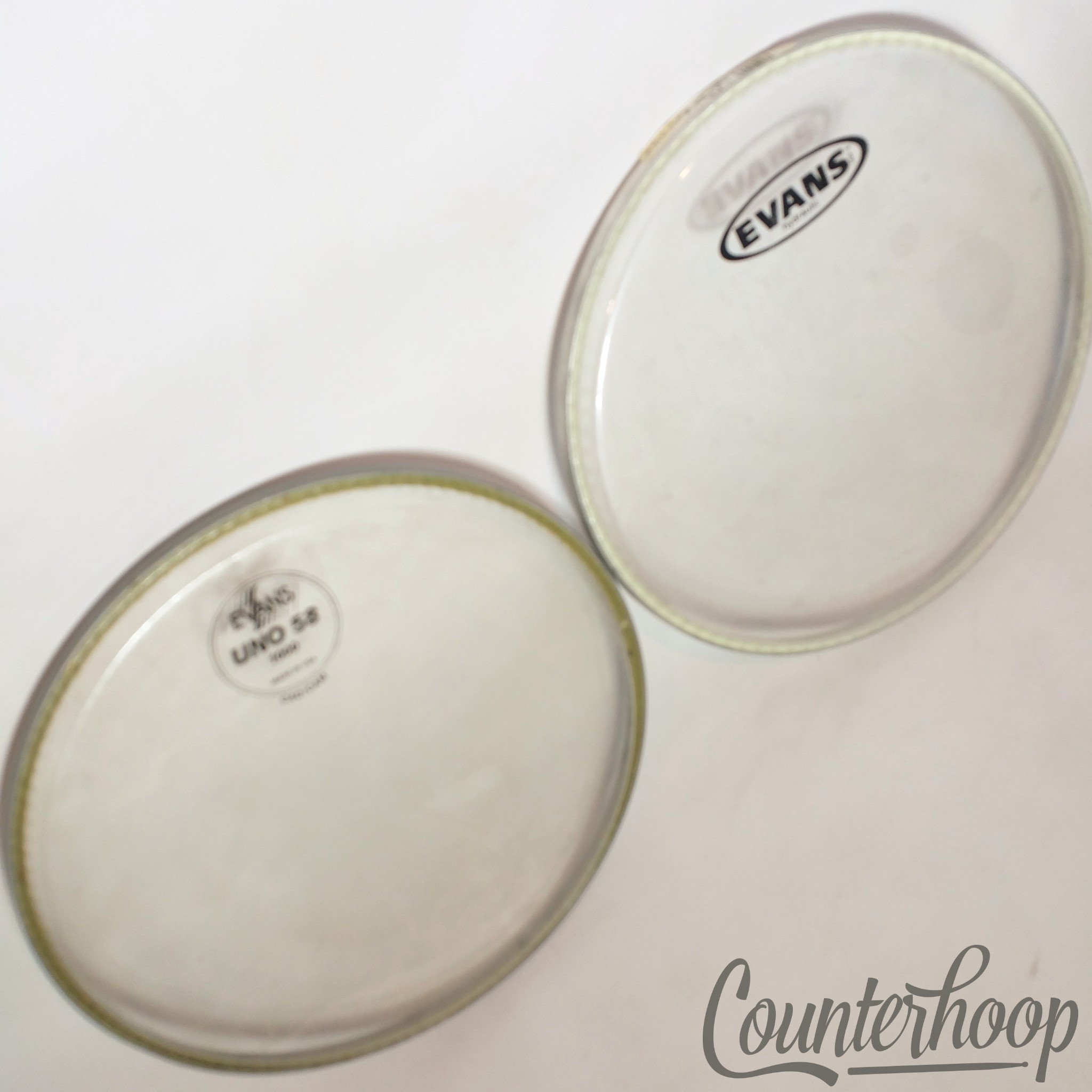 Evans 2x 10" Tom Drum Heads Hydraulic+Uno 58 Cad/Cam Clear Batter/Resonant USA* — main photograph