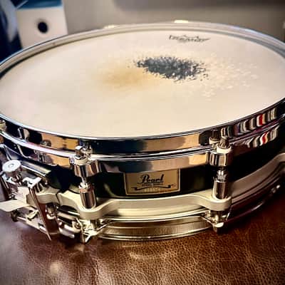 PEARL DRUMS  3-1/2” x14” Free Floating Steel Shell  Piccolo Snare Model number SL-8114P 1997 - Black image 1