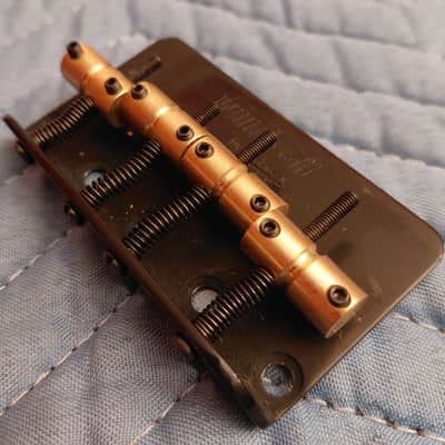 Wilkinson 4-string bass bridge black w/brass saddles, like new image 2