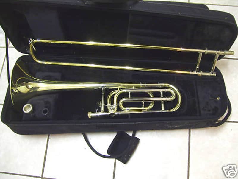 New Gold color trigger trombone,  With case and mouthpiece image 1
